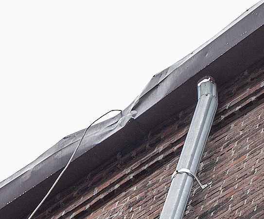 August 2021 - damaged gutter and bricks at north alley party wall