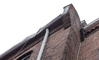 August 2021 - damaged gutter and bricks at north alley party wall