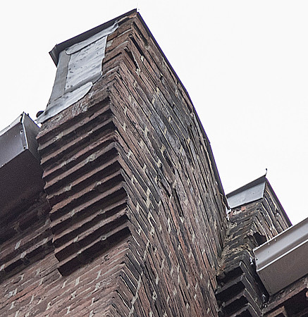 August 2021 - damaged gutter and bricks at north alley party wall